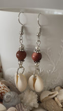 Load and play video in Gallery viewer, Cowrie Shell Earrings - Sandstone
